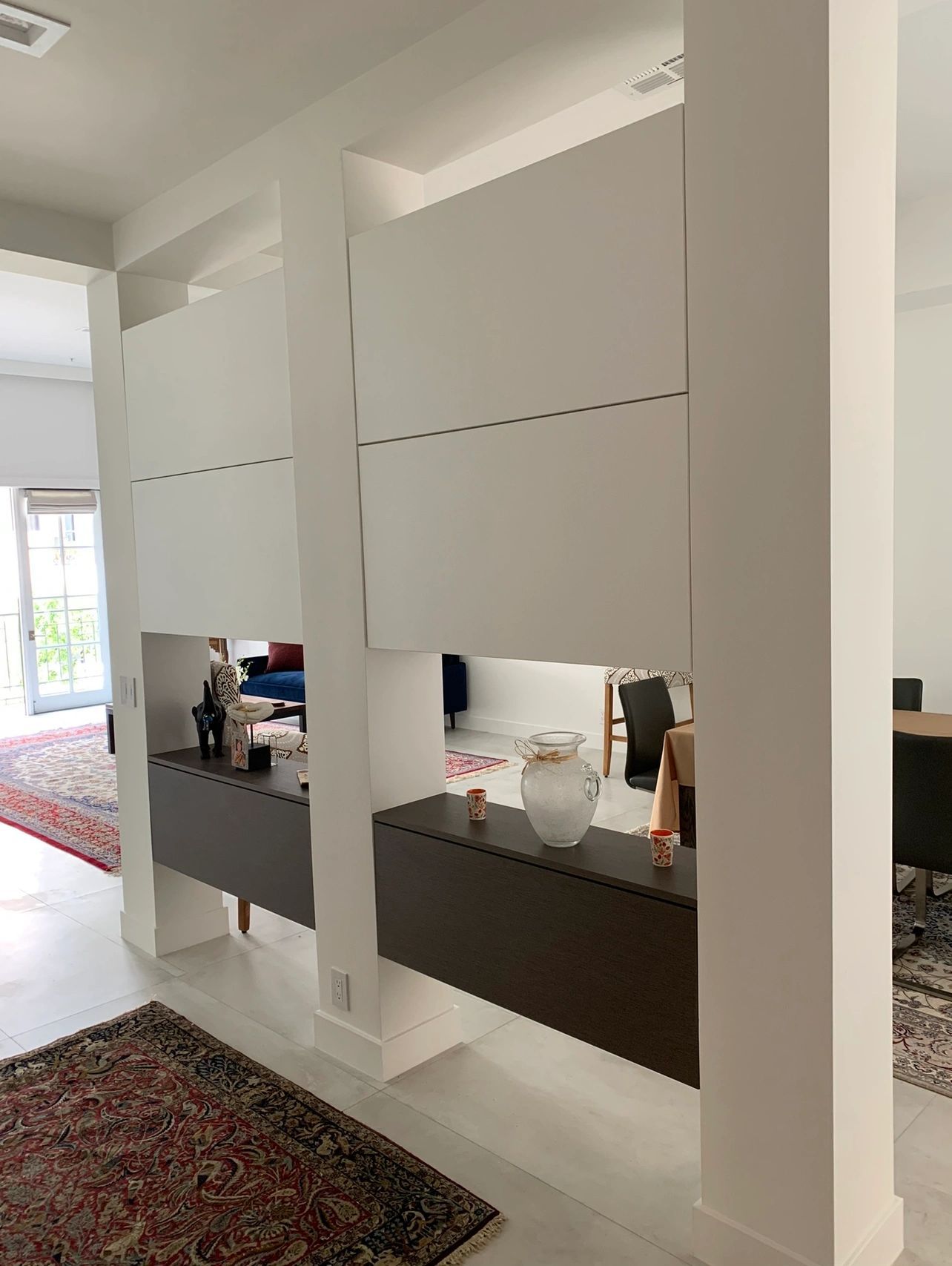 Floating room divider shelving and cabinetry unit