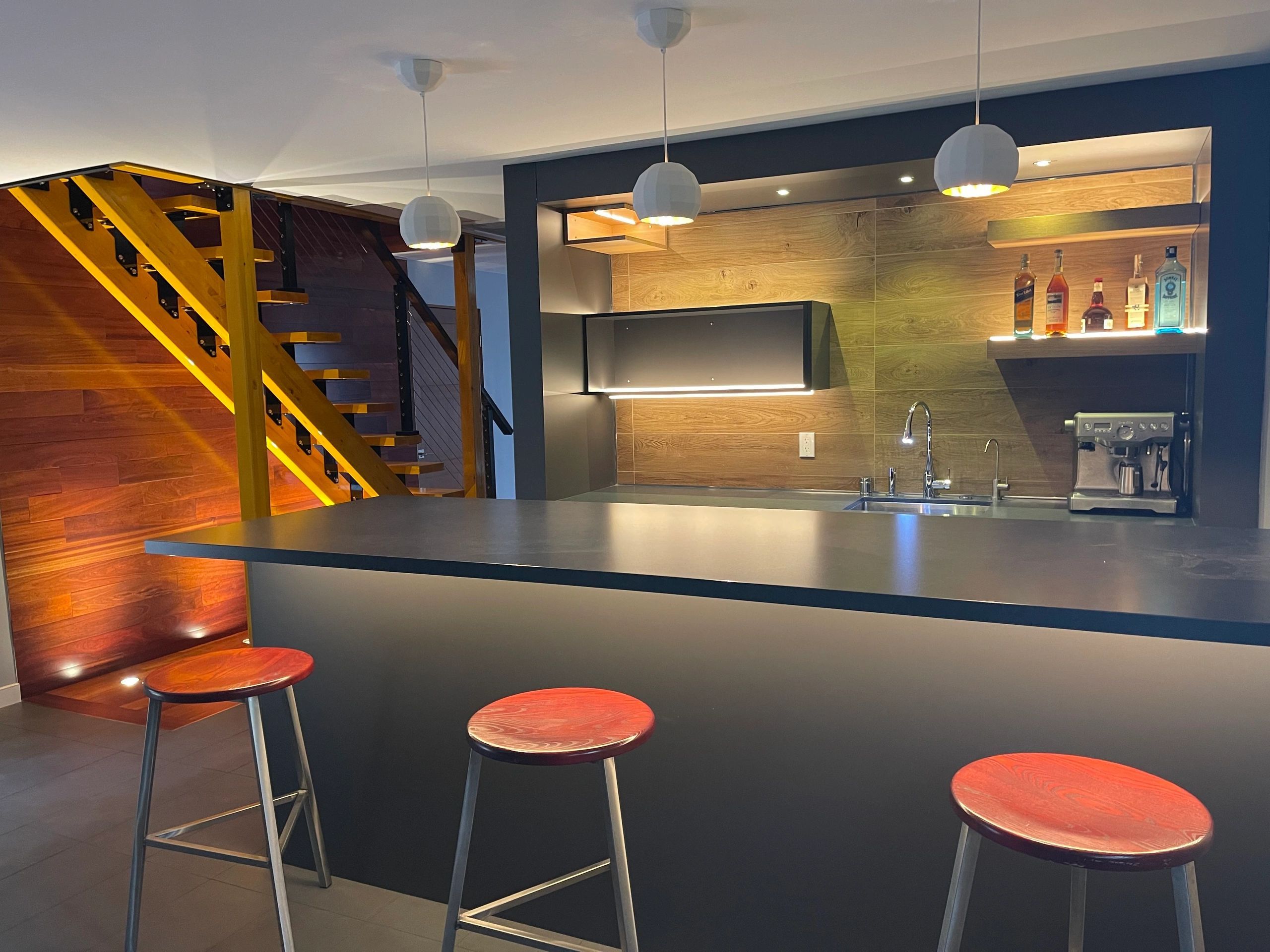 Dark lacquer bar with counter seating