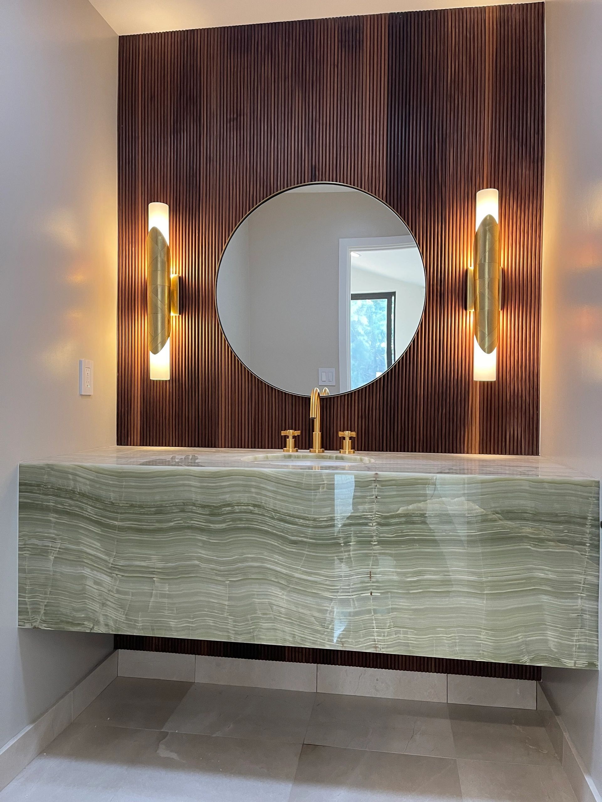 Bathrooms and vanities by NIC Cabinetry - Floating and furniture-style vanities, detailed to live with stone and water.