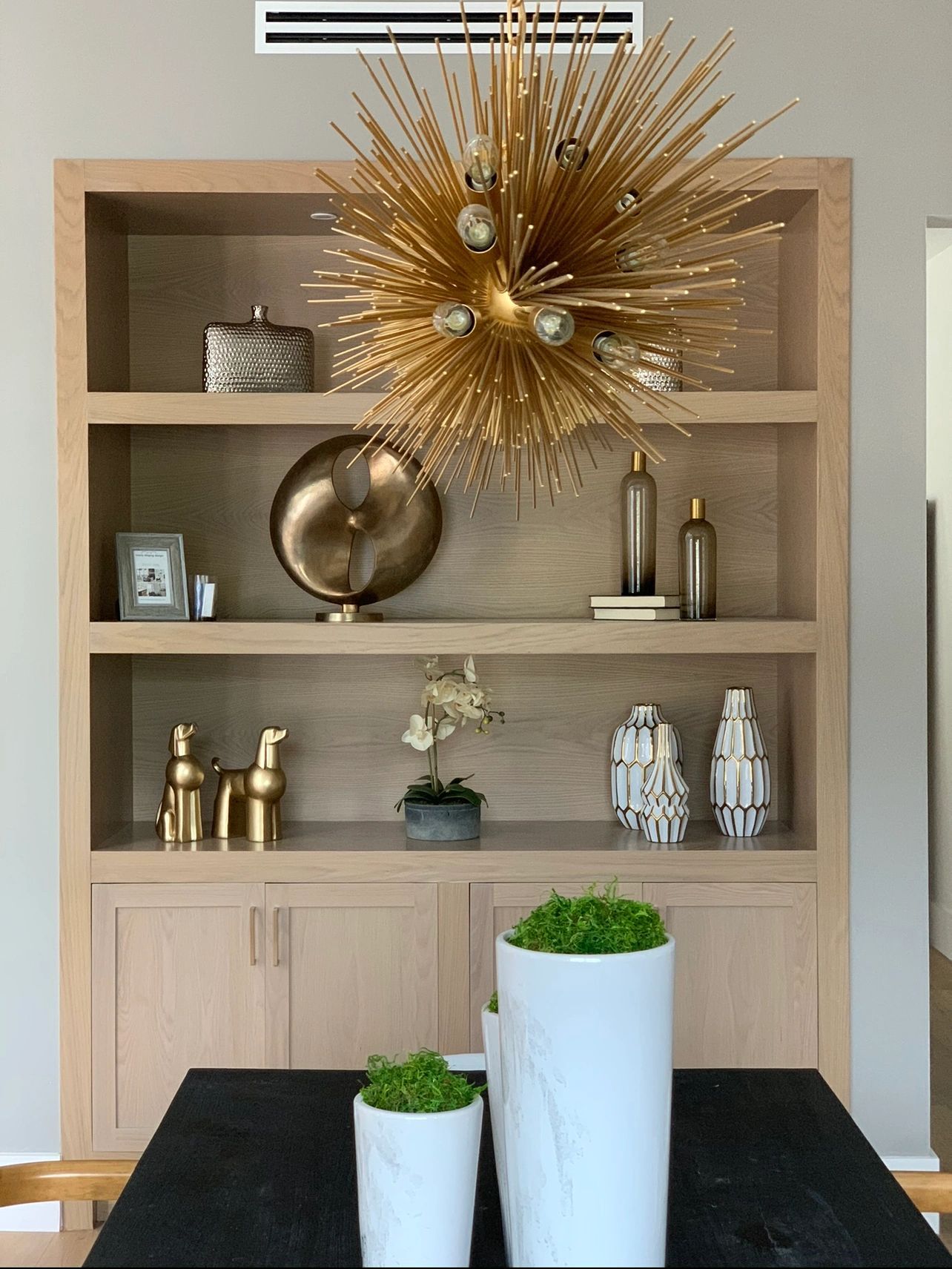Light wood display hutch and media center cabinetry