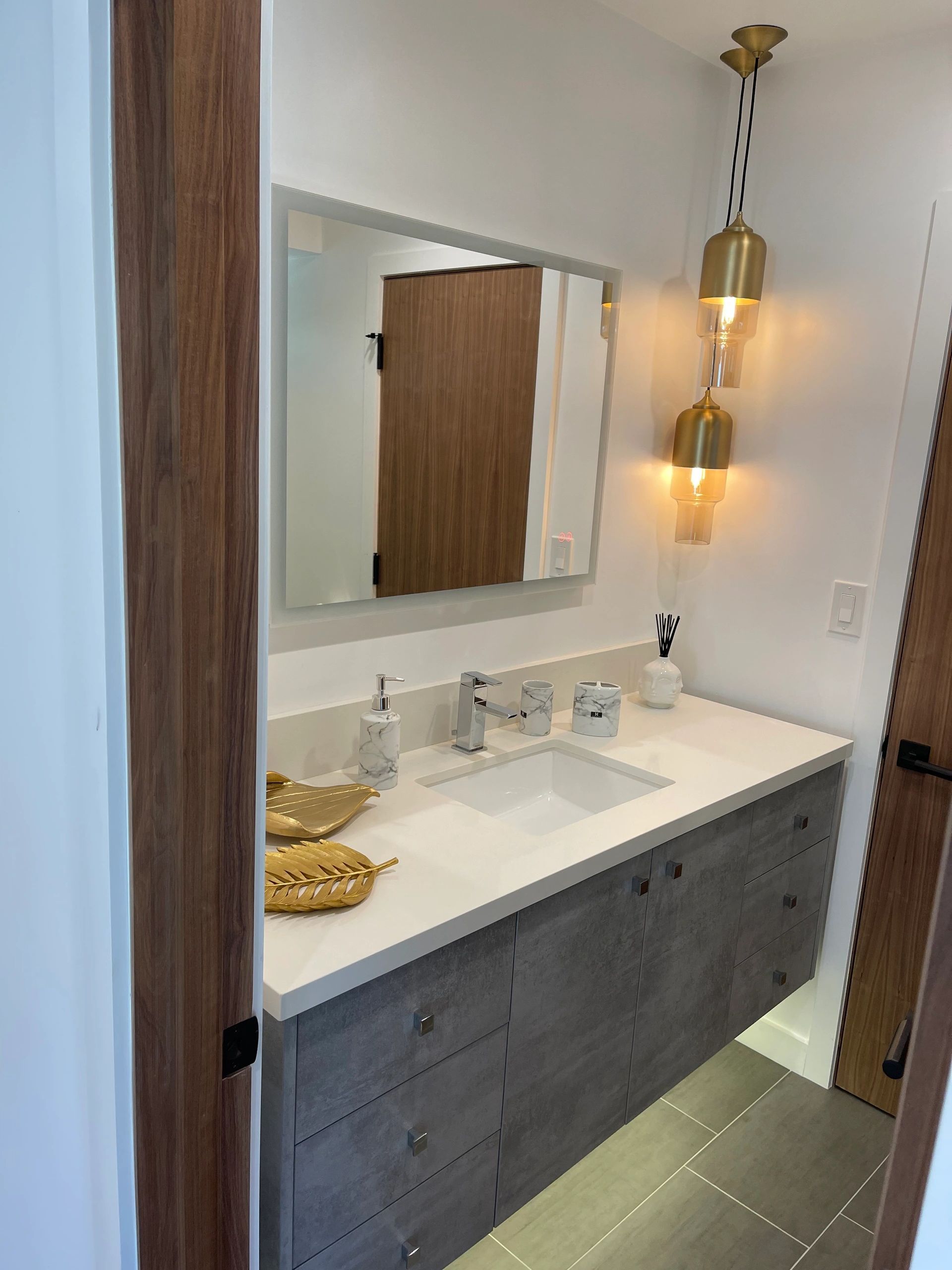 Grey painted vanity with white marble top