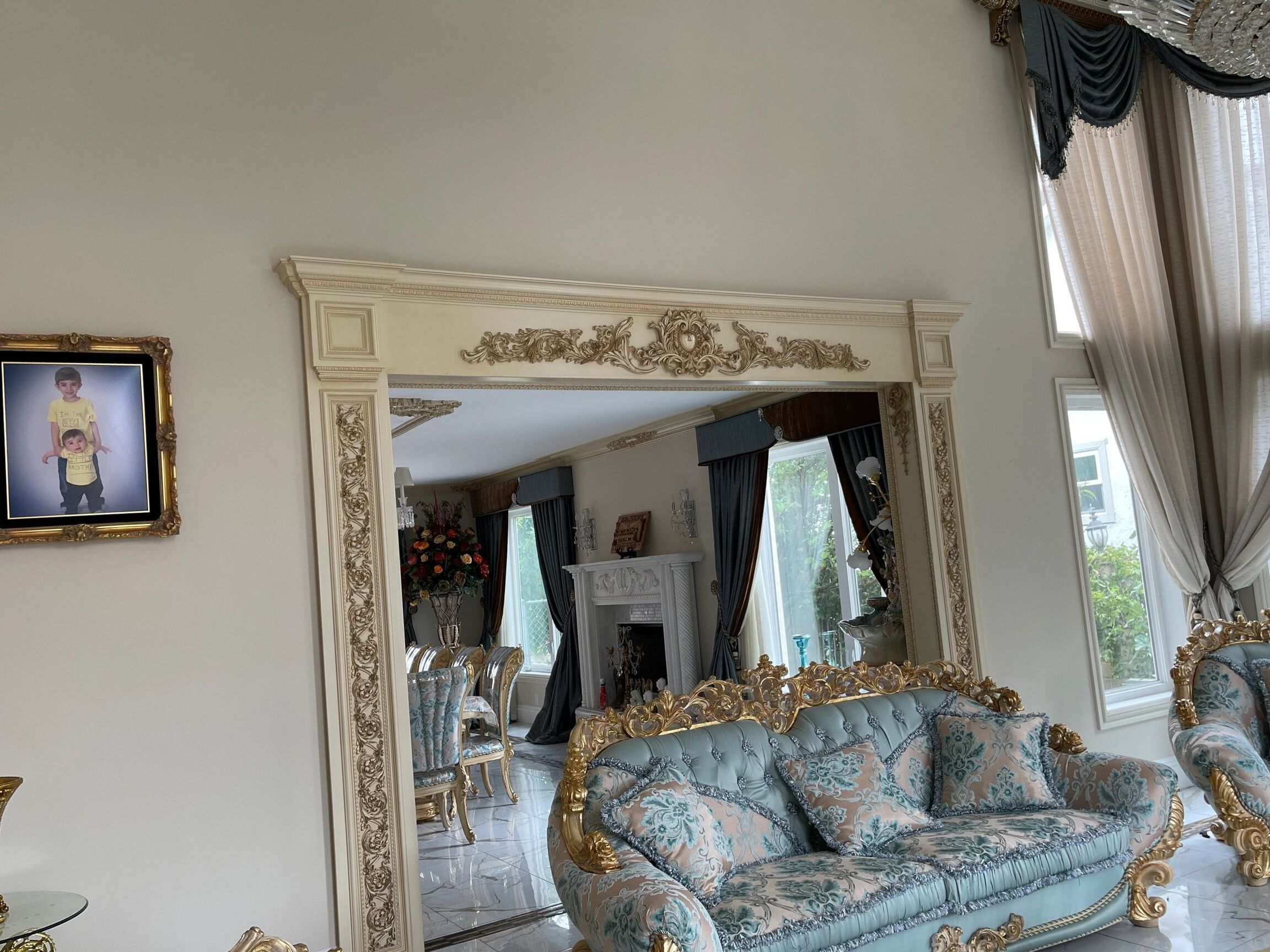 Ornate fireplace surround mantel and matching cabinets
