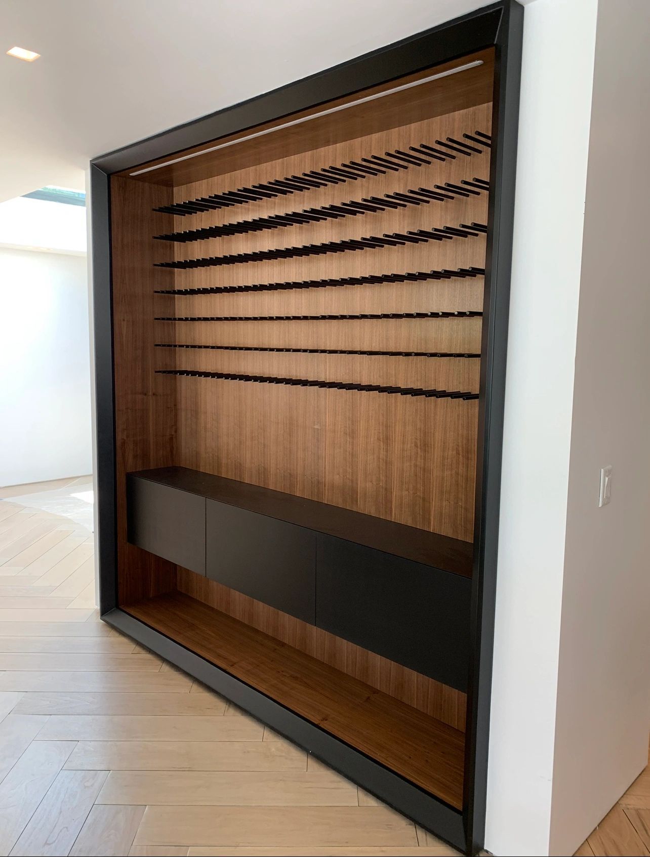 Bars and wine rooms by NIC Cabinetry - Back-bars, bottle walls and wine rooms, racked and lit for real collections.